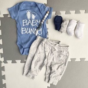 Baby bundle: onesie, sweat pants, & accessories.